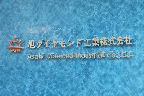 Asahi Diamond Industry signboard and logo